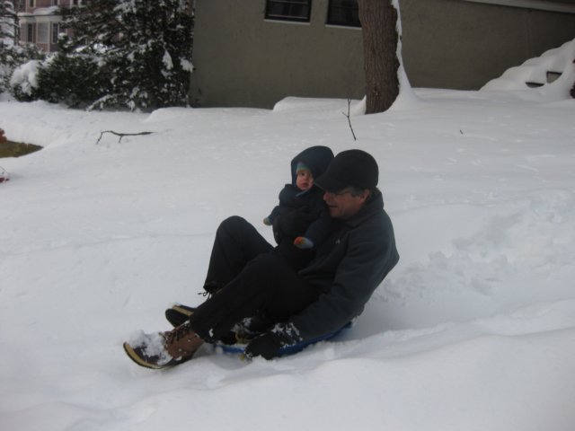 sleddingwithunclegeorge.jpg